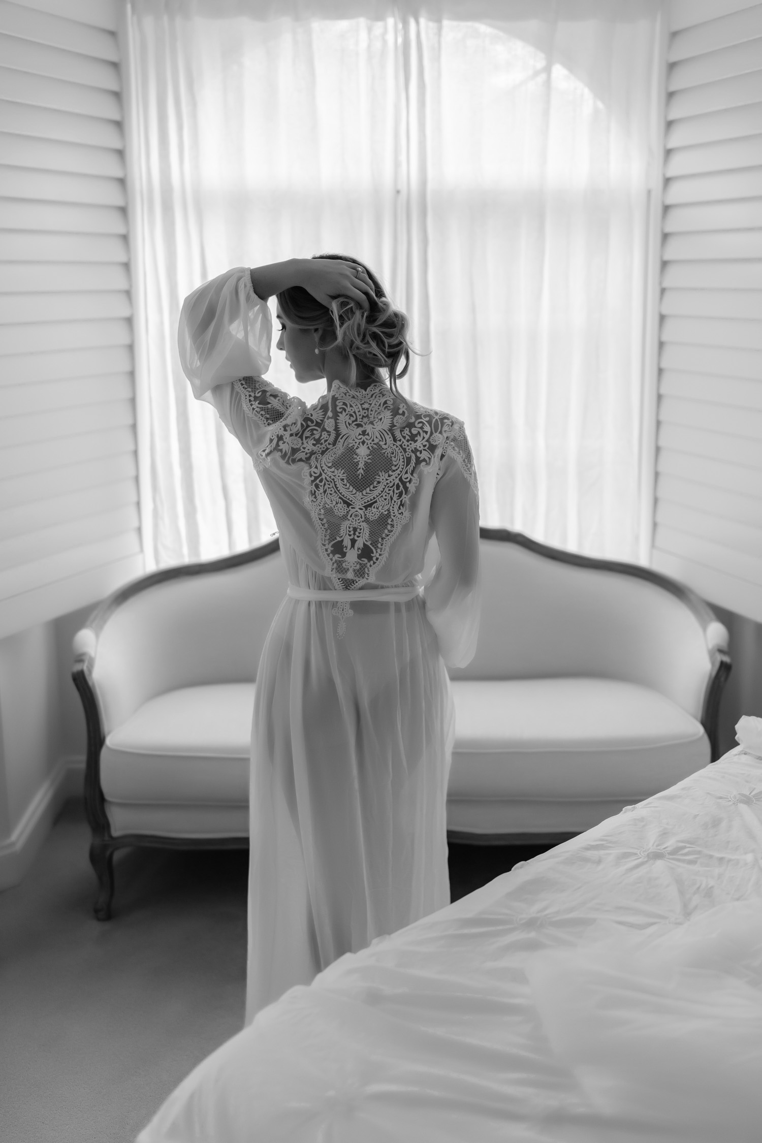 bridal boudoir photography sydney woman in bridal robe in black and white image.